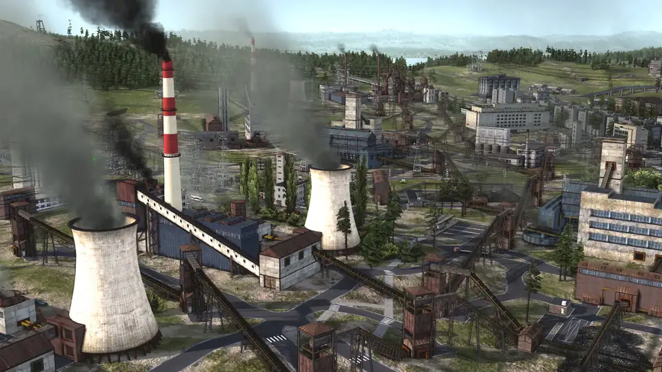 A heavy-industry district: cooling towers, a smoking stack and conveyor bridges linking the plants.